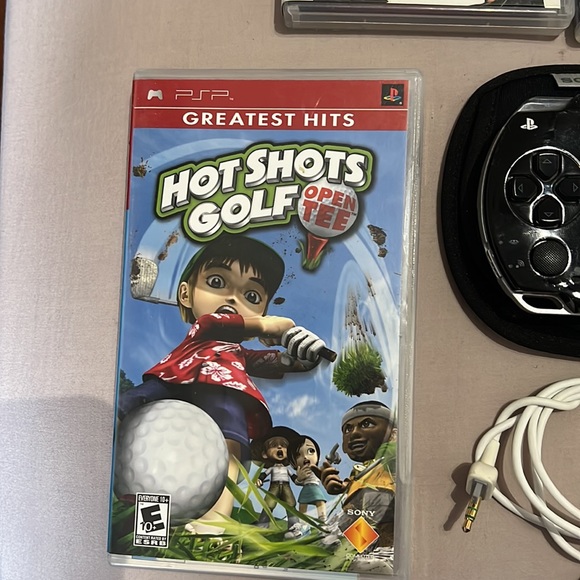 PSP w/ 6 games and charger and headset converter - Picture 2 of 8
